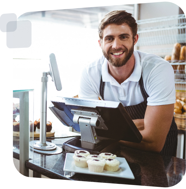 male cashier leaning